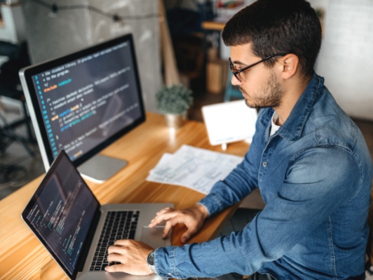 Developer using online business tools